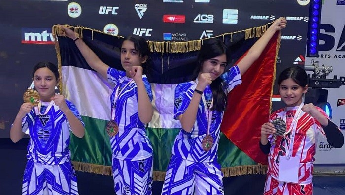 لفريق الفلسطيني المشارك في بطولة آسيا للفنون القتالية المختلطة للهواة.jpeg