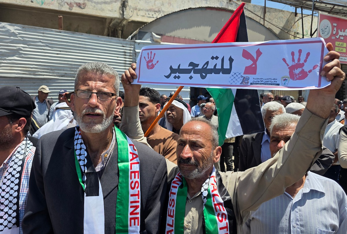 يشارك فلسطينيون في فعالية لإحياء الذكرى الثامنة والسبعين للنكبة في خان يونس جنوب قطاع غزة، يوم الإثنين 11 مايو/أيار 2026. (صورة: طارق محمد)
