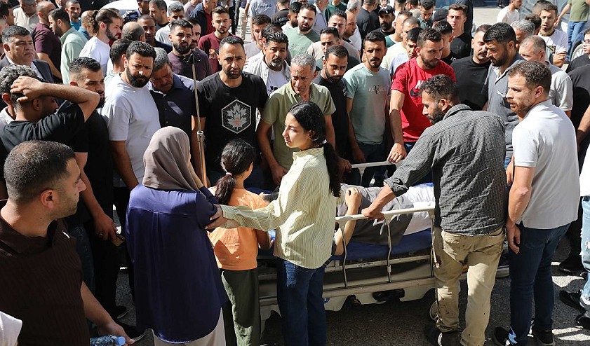 جانب من وداع جثمان أحد الشهداء في بلدة تل (Getty Images).jpg