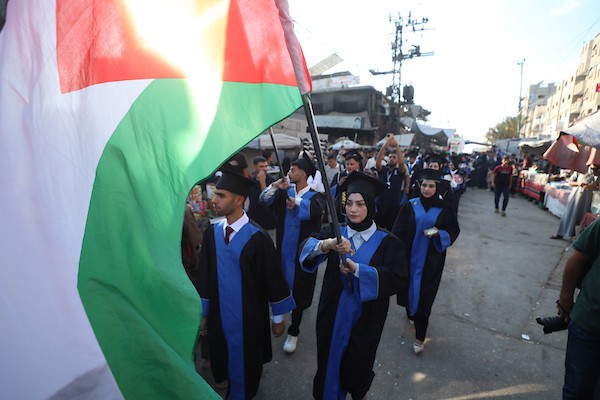 حفل تخرج في كلية العلوم التطبيقية الجامعية بمخيم النصيرات للاجئين وسط قطاع غزة في 24 سبتمبر/أيلول 2026. تصوير: حسن الجدي