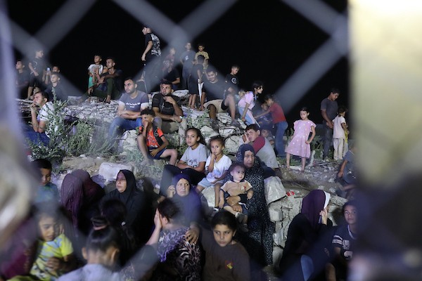 شارك طلاب فلسطينيون في حفل تخرج أقيم في الكلية الجامعية للعلوم التطبيقية وسط مبانٍ مدمرة في مدينة غزة، قطاع غزة، في 20 سبتمبر/أيلول 2026. تصوير: بلال أسامة