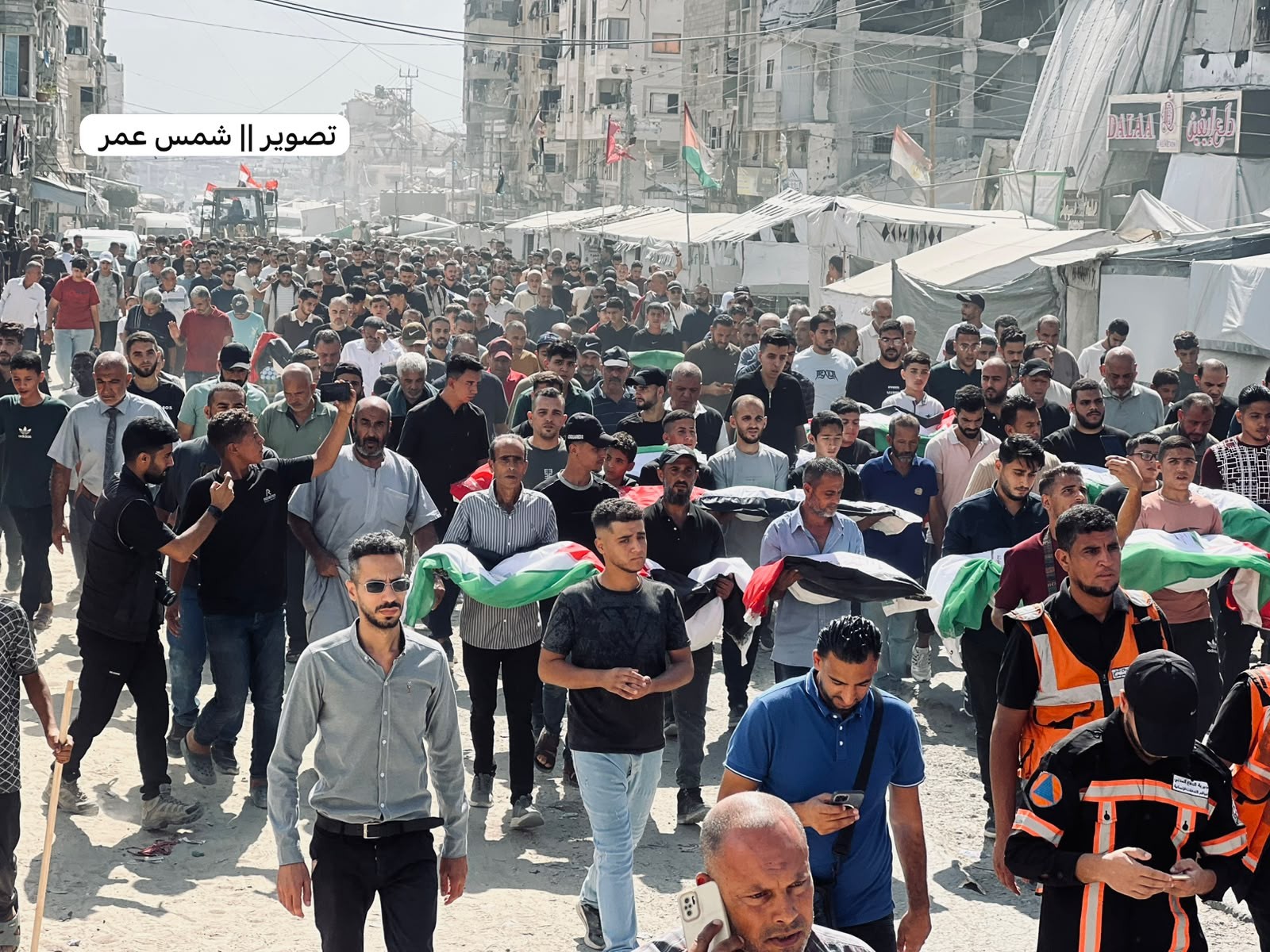 مراسم تشييع جثامين 105 شهداء انتشلتهم من تحت أنقاض مجزرة مربع التاج.jpg